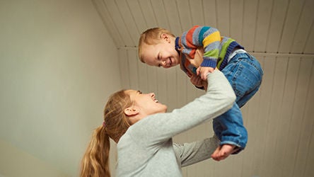 mother playing with toddler