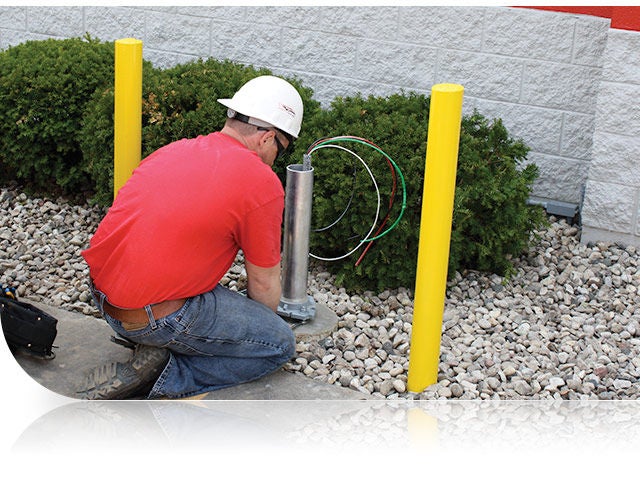 Contractor installing an EV charger