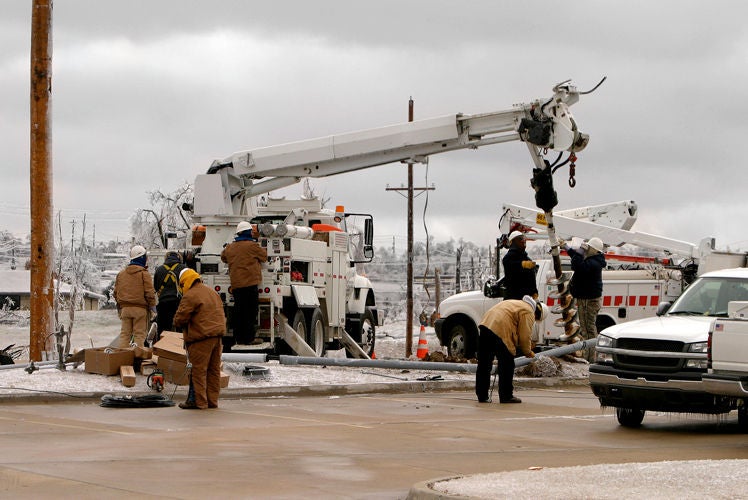 Work being done to repair storm damage in winter