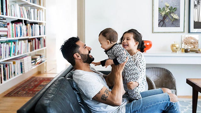 Father playing with children